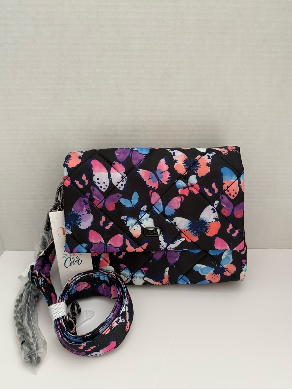 LUG Plié Quilted Butterfly Crossbody Bag - Black, Purple, Pink, Blue